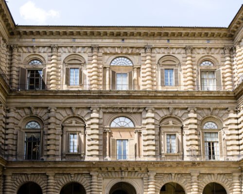 A closeup of the Pitti Palace Facade in Florence, Italy